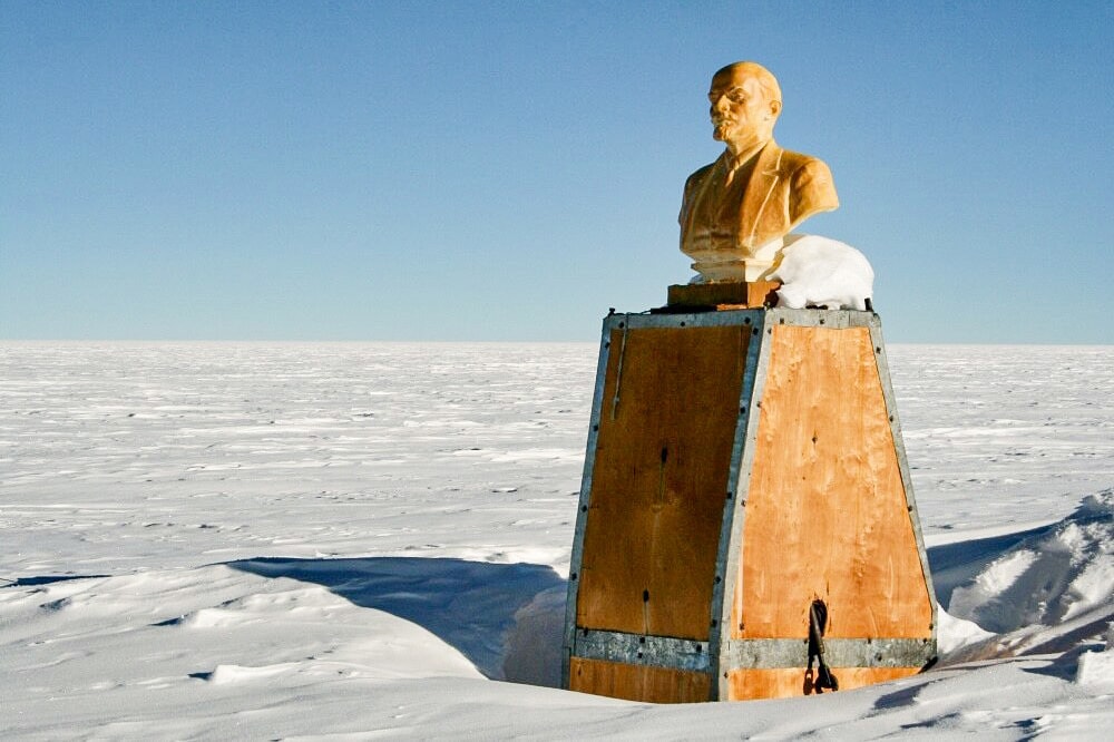 Lenin's bust surrounded by snow
