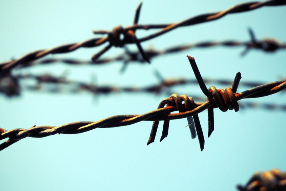 Barbed wire at a dangerous border crossing