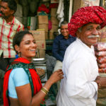 India couple smiling at the camera – happiest countries in the world 2024