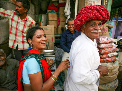 India couple smiling at the camera – happiest countries in the world 2024