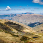 A lone house surrounded by rolling hills on the High Scardus Trail