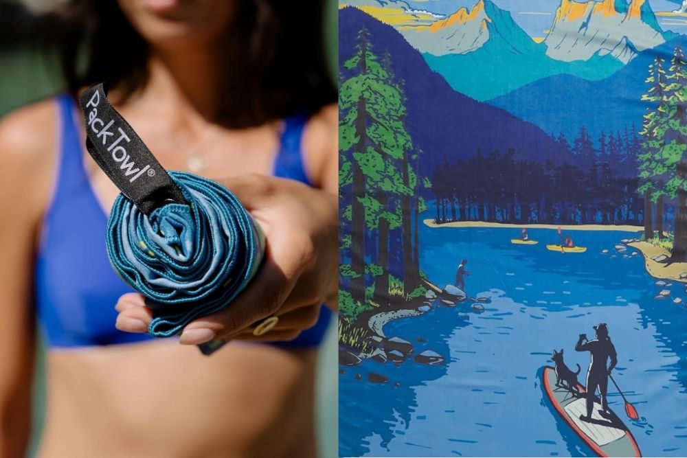 A model holding a rolled up PackTowl