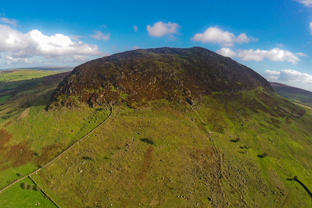 A drone shot of Slemish, one of the most beautiful mountains in the UK