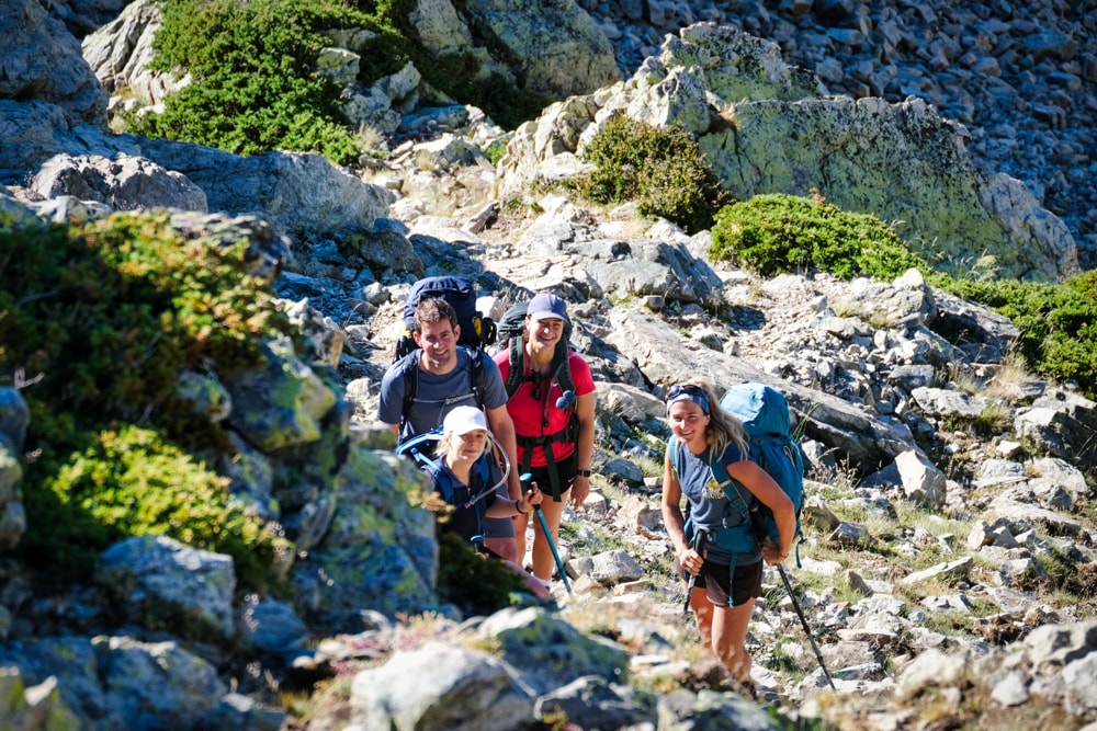 Is the GR20 the toughest trek in Europe? A group of hikers on the GR20 smiling at the camera